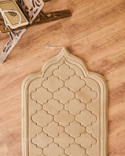 Decorative Memory foam prayer mat padded with geometric pattern on a wooden floor