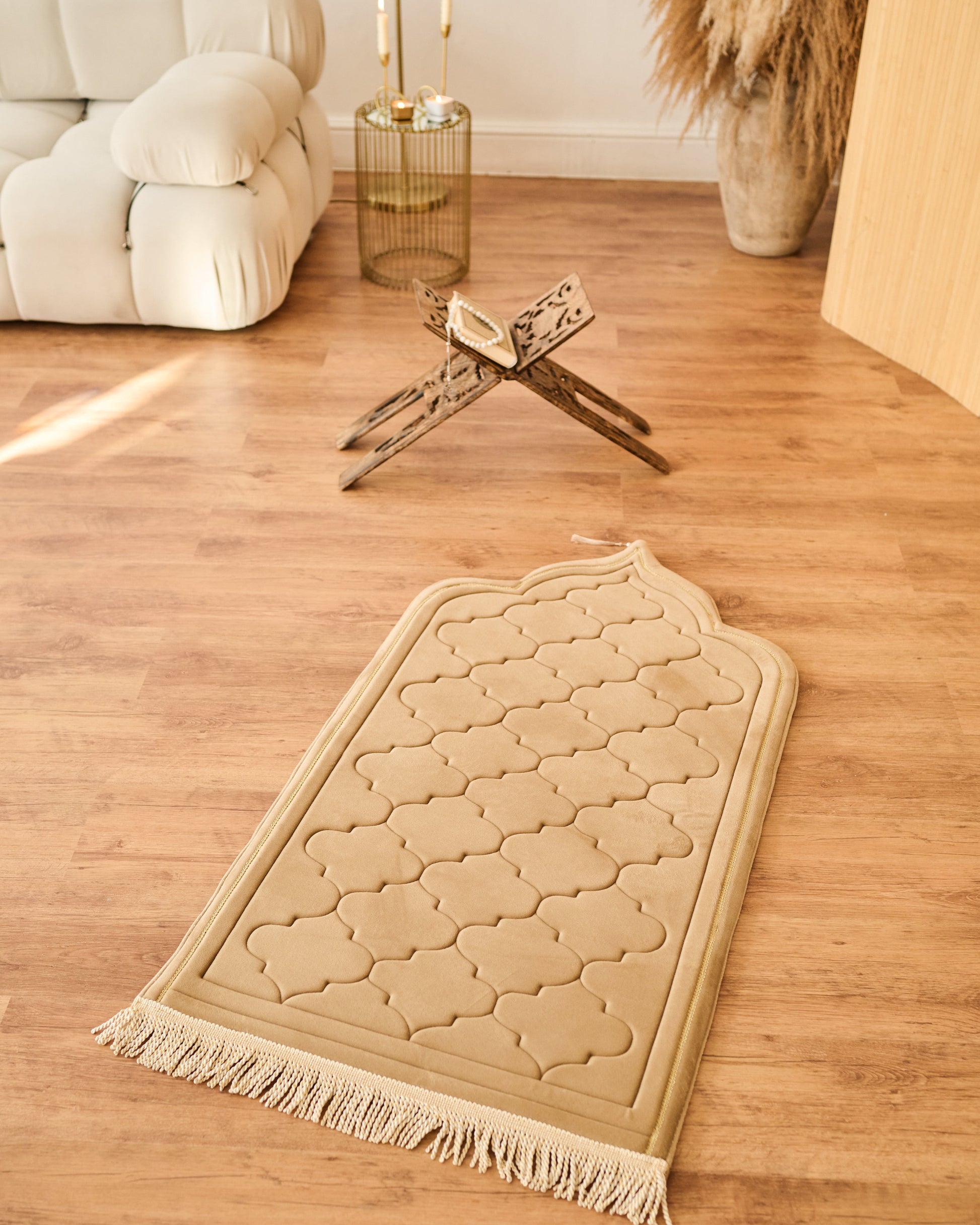 Decorative Memory foam prayer mat padded with geometric pattern on a wooden floor
